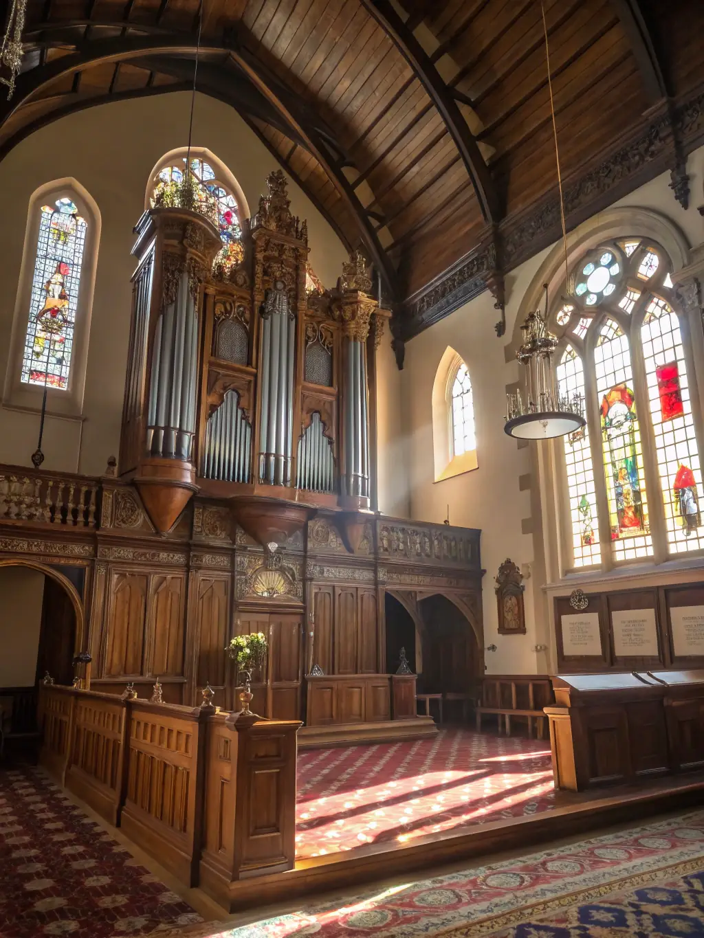 A detailed image of the historic organ inside the Saint-Denis collegiate church, highlighting its intricate pipes and craftsmanship.